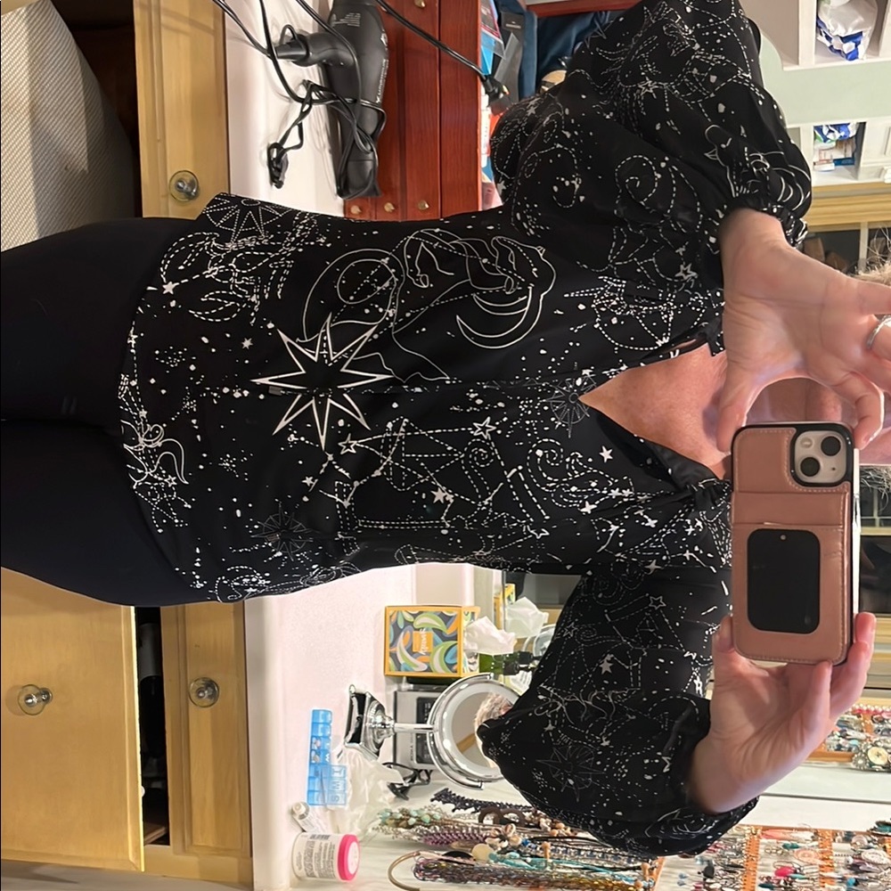 Black Starry Blouse with Puffy Sleeves
Lined.  Very comfy.  Runs a little big